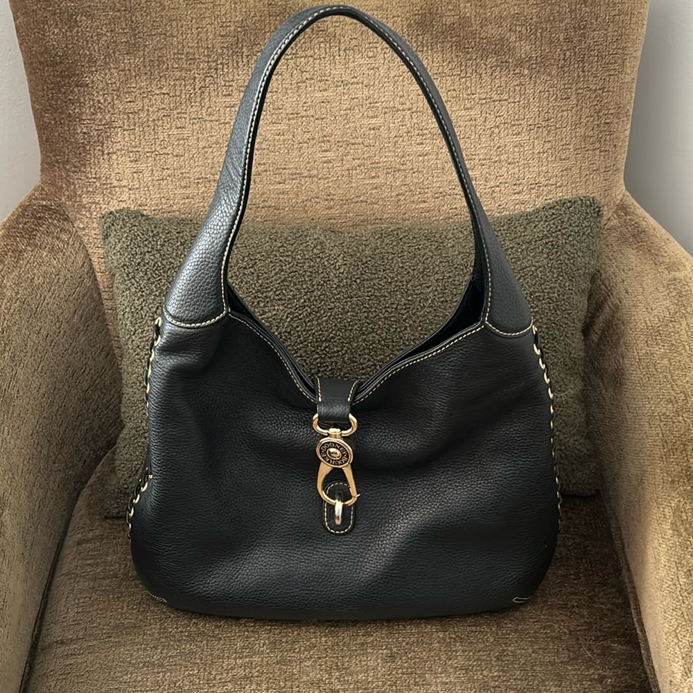 Black Leather Dooney Bourke shoulder bag. Gold accents.